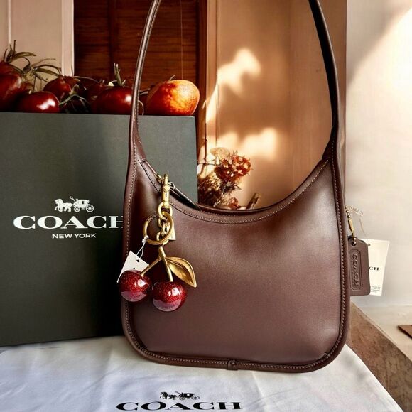 Coach Handbags - 🚫SOLD🚫 Coach Curve Zip Limited Ed Shoulder Bag Maple/Brass & Cherry Charm